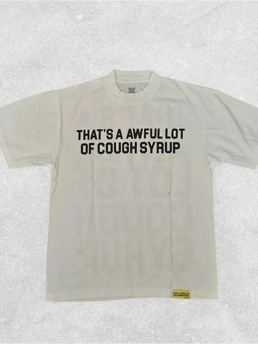 Cream Graphic Short Sleeve Tee with Bold Black Text